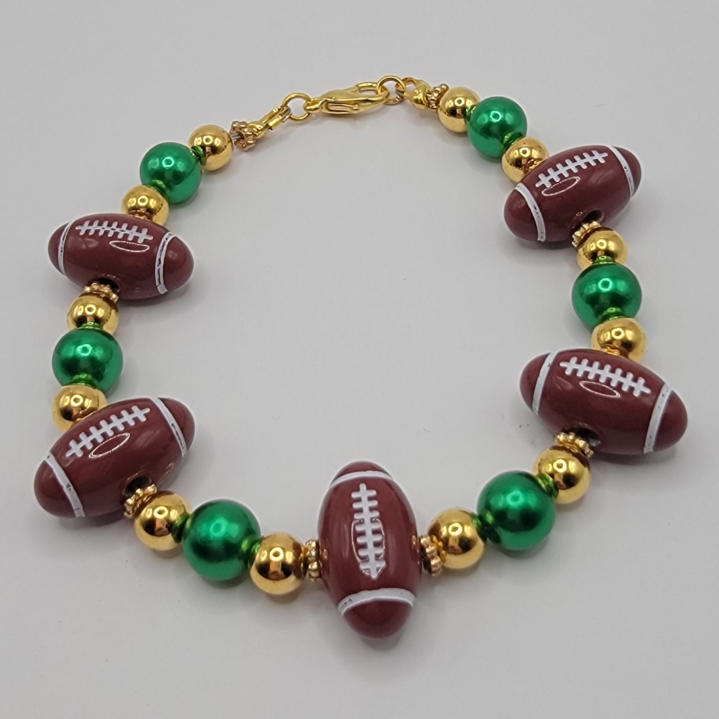 Handmade Green, Gold and Football Beaded Bracelet