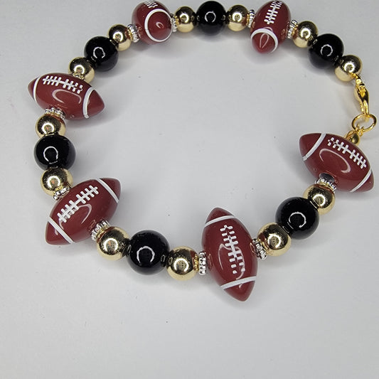 Handmade New Orleans Saints Football inspired black and gold bracelet